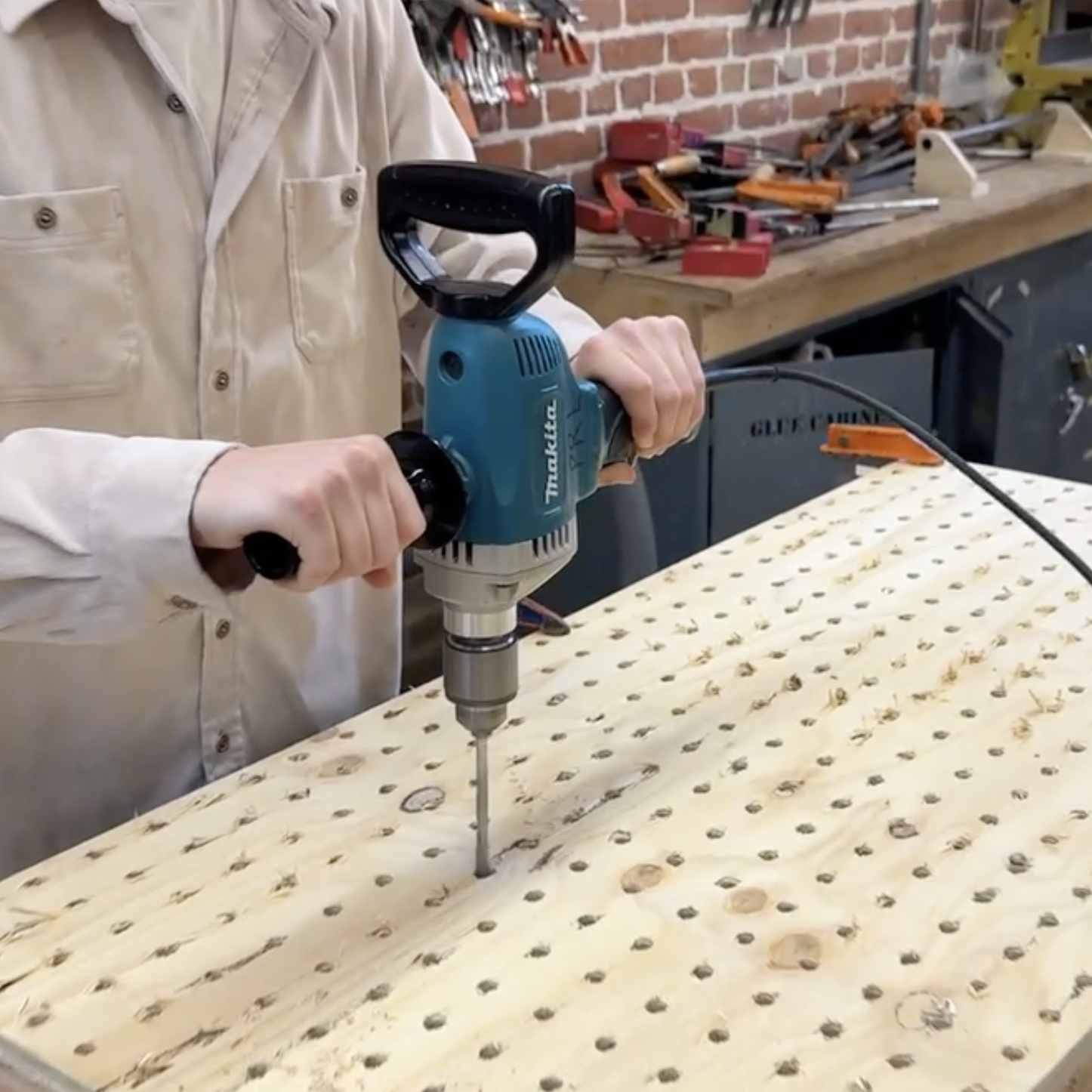 Me drilling the boards.